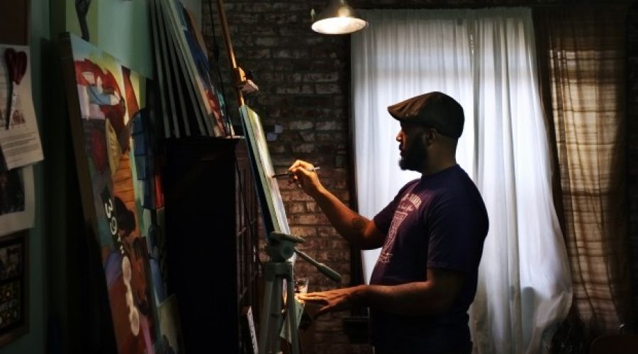 Artist's paintings of African-American family life attract broad audience